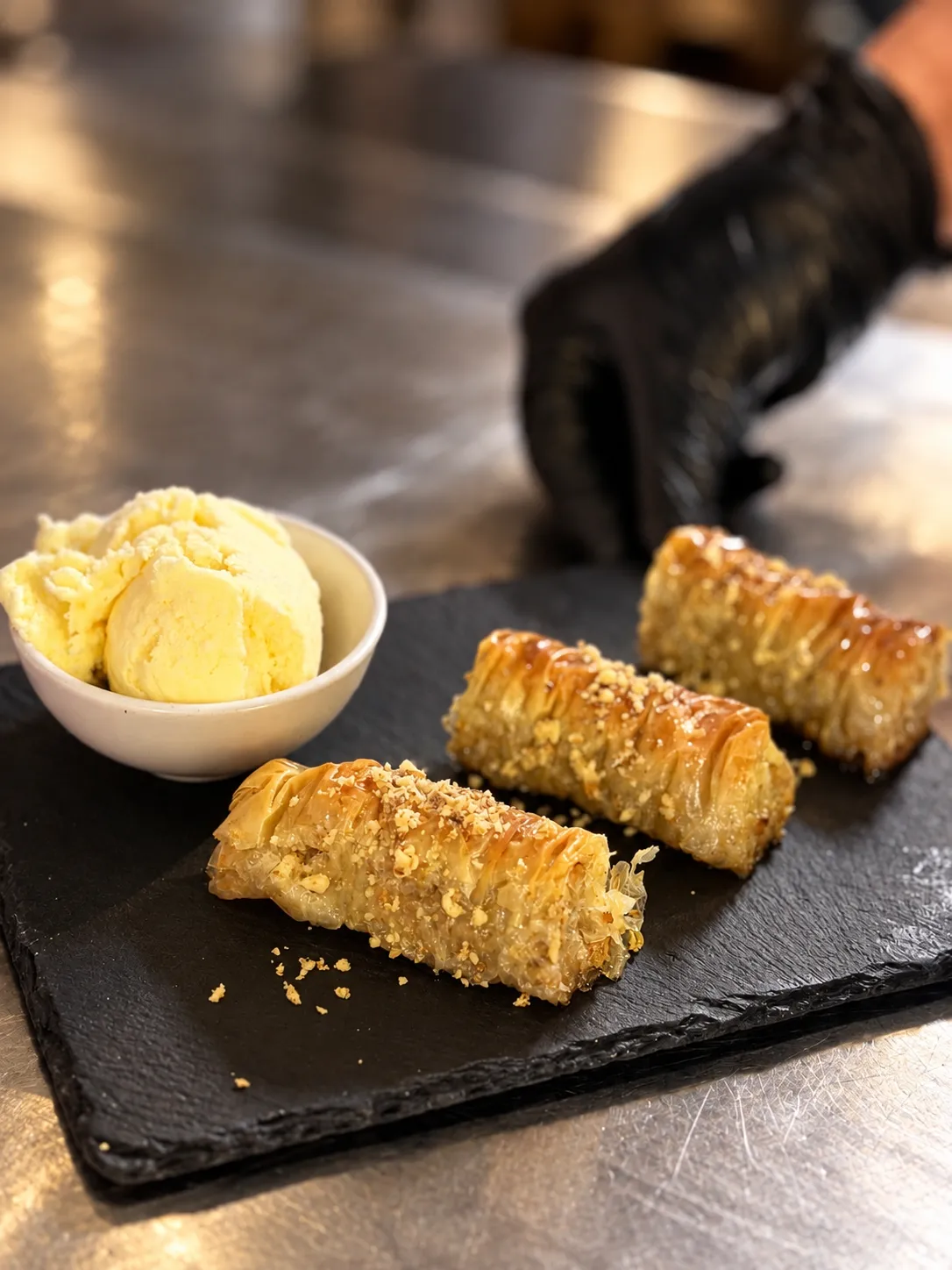 Pistachio baklava served with ice cream