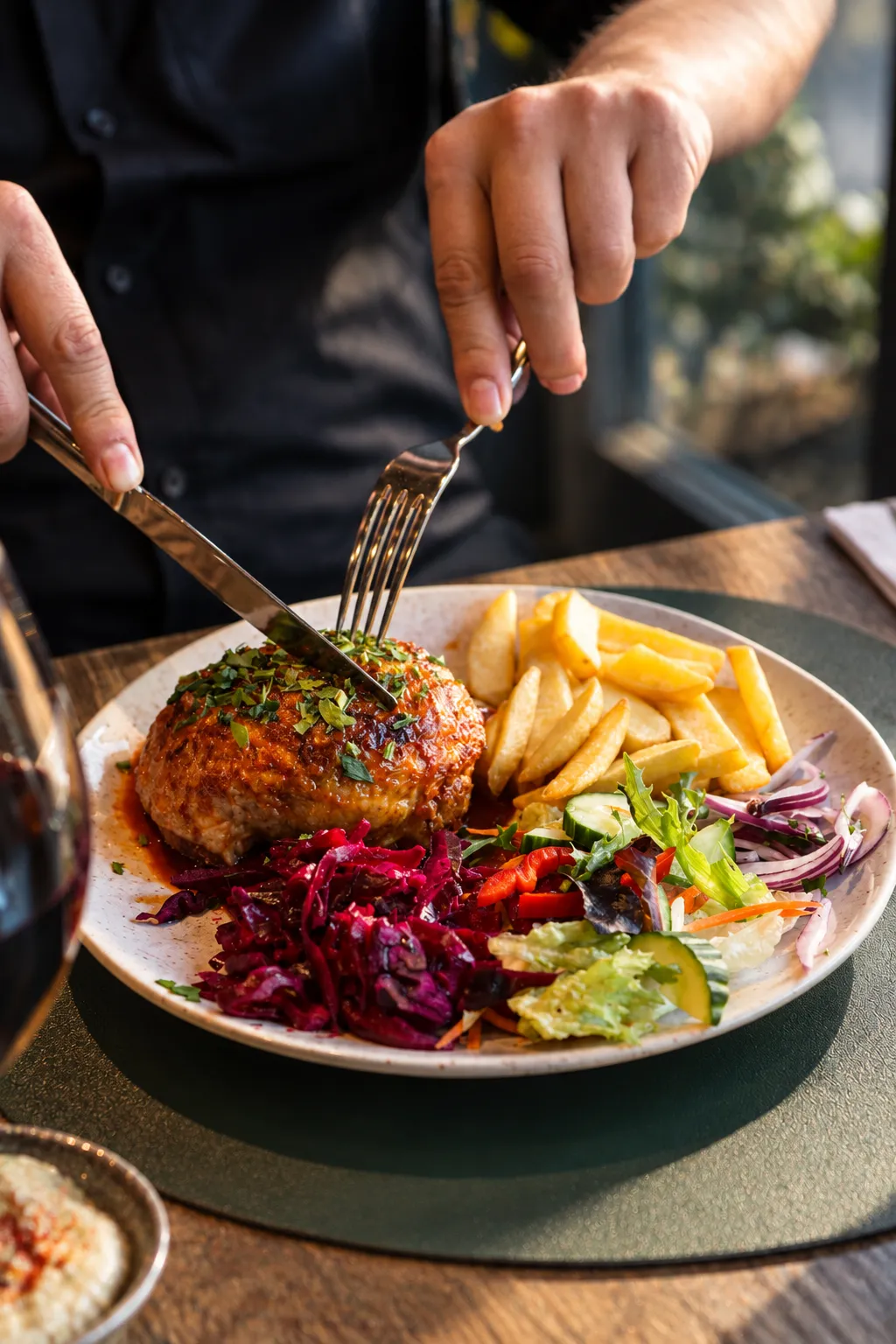 Kofte with chips and colourful salad