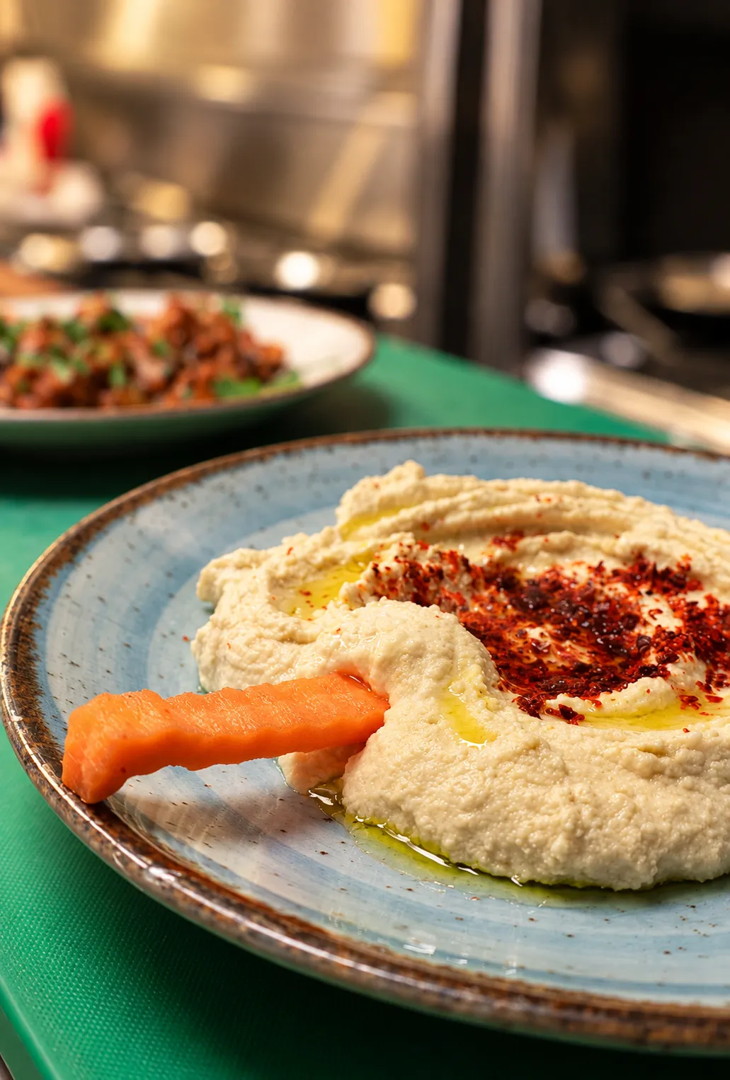 Houmous drizzled with olive oil and chilli